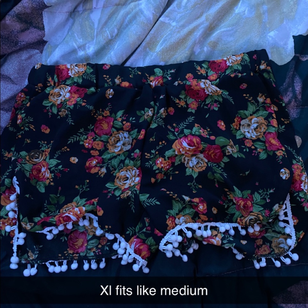 Flowery shorts with Pom Pom tassels
